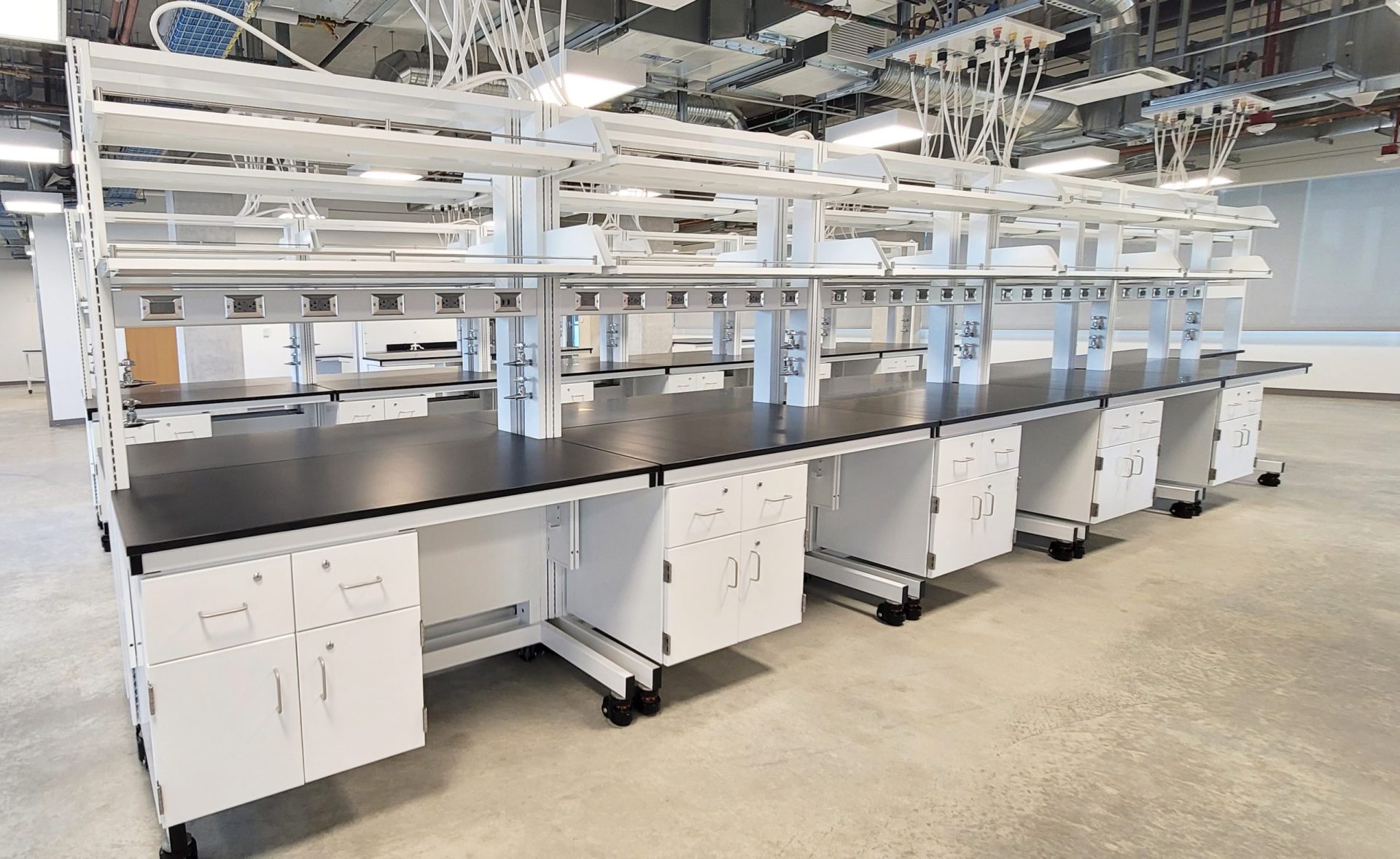 Sigma Carts with suspended cabinets, in a lab